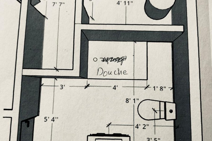 Hand-drawn measured plan of a washroom with dimensions