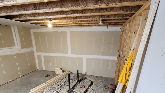 Basement being framed and drywalled during a residential renovation